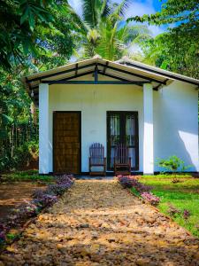 Zahrada ubytování Banana Shade Cottage