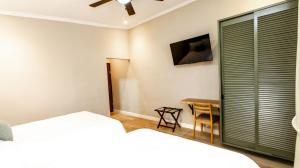 Postel nebo postele na pokoji v ubytování Hotel Boutique Los Abetos