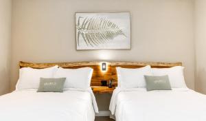 Postel nebo postele na pokoji v ubytování Hotel Boutique Los Abetos