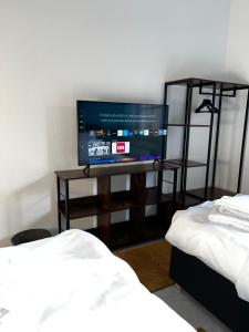 Postel nebo postele na pokoji v ubytování MARLEI 6 Apartment mit 3 Schlafzimmern, gemütlichen Wohnbereich, mit 2 WCs