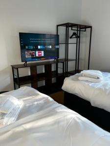 Postel nebo postele na pokoji v ubytování MARLEI 6 Apartment mit 3 Schlafzimmern, gemütlichen Wohnbereich, mit 2 WCs