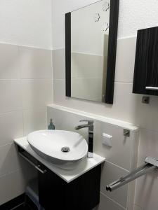 Koupelna v ubytování MARLEI 6 Apartment mit 3 Schlafzimmern, gemütlichen Wohnbereich, mit 2 WCs