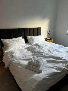 Postel nebo postele na pokoji v ubytování MARLEI 6 Apartment mit 3 Schlafzimmern, gemütlichen Wohnbereich, mit 2 WCs