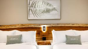 Postel nebo postele na pokoji v ubytování Hotel Boutique Los Abetos