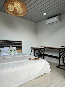 Postel nebo postele na pokoji v ubytování Puk's Palace Thailand