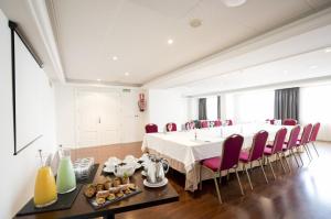Nápoje v ubytovaní Hotel Almirante