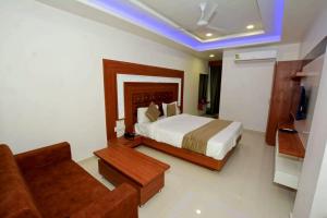 HOTEL GREEEN LEAF客房内的一张或多张床位