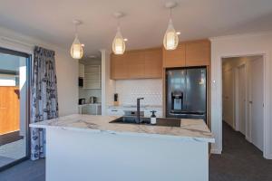 a kitchen with a sink and a counter top at The Shepherds Retreat in Richmond