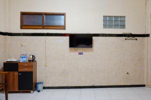 TV a/nebo společenská místnost v ubytování Dya Hotel Boyolali