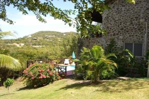 a view from the garden of a house at Bright & Beautiful 2 Bedroom Villa in Cap Estate