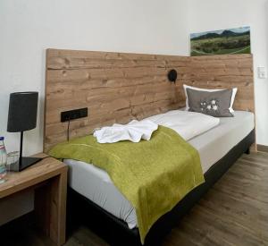 Postel nebo postele na pokoji v ubytování Gästehaus Seeklause