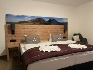 Postel nebo postele na pokoji v ubytování Gästehaus Seeklause