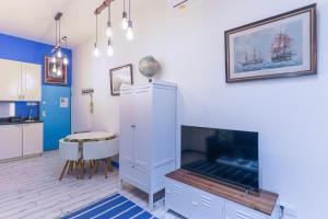 Kuchyňa alebo kuchynka v ubytovaní Studio Travel 24M2, 120m Vieux-Port ,Clim , Wifi ,Accès autonome avec code + 4 fotografie
