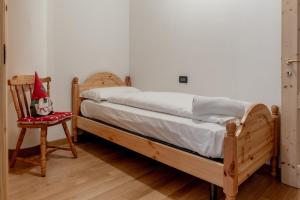 A bed or beds in a room at Residence Stella