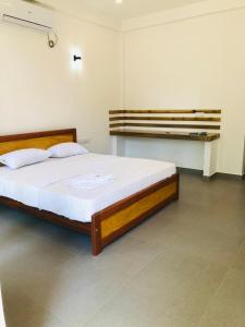 Tempat tidur dalam kamar di HIRI Fortress