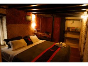Letto o letti in una camera di Hira Guest House