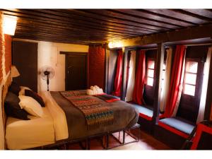 Letto o letti in una camera di Hira Guest House