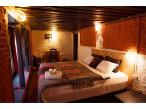 Letto o letti in una camera di Hira Guest House