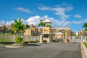 a parking lot in front of a building at Ocean & Mountains View, Marina, Ferry, Vista Mar, Costa Esmeralda in Ceiba