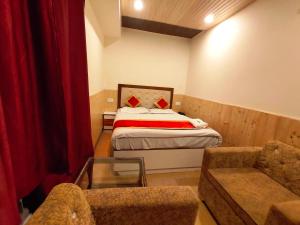 Ліжко або ліжка в номері Hotel Shorya
