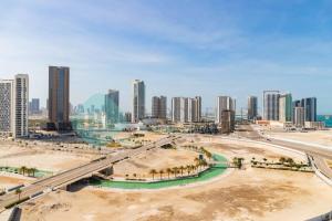a view of a city with tall buildings at Grandeur Studio In Pixel in Abu Dhabi