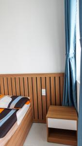 Postel nebo postele na pokoji v ubytování Homestay Khải Minh