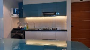 Kuchyň nebo kuchyňský kout v ubytování 'Savitham' City View flat in Trivandrum