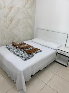 Postel nebo postele na pokoji v ubytování AP Família térreo 2 quartos