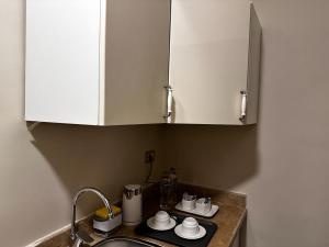 A kitchen or kitchenette at Rentrific