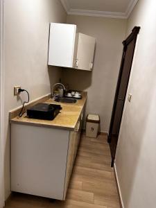 A kitchen or kitchenette at Rentrific