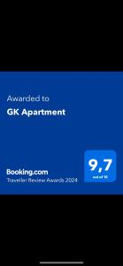 キオスにあるGK Apartmentの青いスクリーン付携帯電話のスクリーンショット