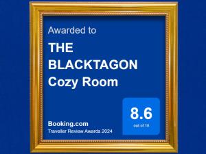 美茵河畔法蘭克福的住宿－THE BLACKTAGON Cozy Room，黑色美国舒适间的一个框架标志