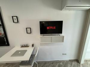 Telewizja i/lub zestaw kina domowego w obiekcie SaltilloLoft