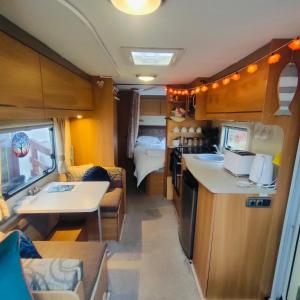 Voodi või voodid majutusasutuse Kintyre Caravan toas