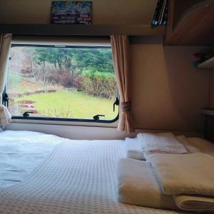 Voodi või voodid majutusasutuse Kintyre Caravan toas