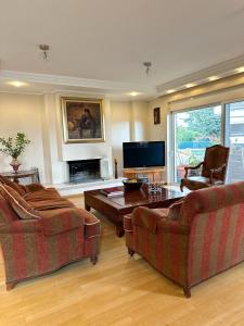 Et opholdsområde på Villa in Voula 5 mins from the Beach