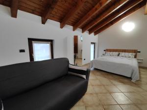 Ένα ή περισσότερα κρεβάτια σε δωμάτιο στο Casa Ninetta