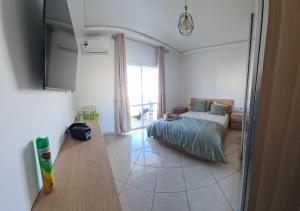 Letto o letti in una camera di SOLEIL DE MARTIL