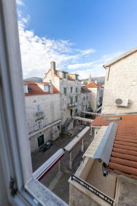 a view from a window of a city with buildings at Villa Fontana in Trogir