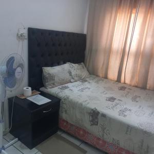 Кровать или кровати в номере Campafela Guest House