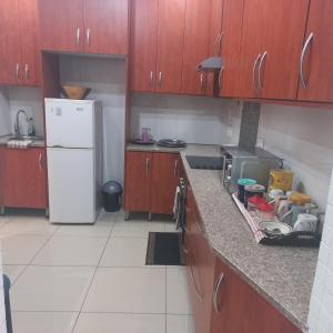 Majoituspaikan Campafela Guest House keittiö tai keittotila