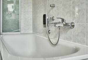 Koupelna v ubytování Teichhotel