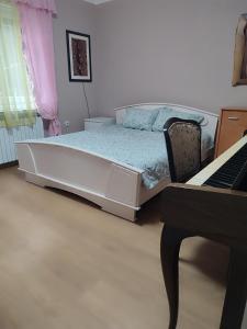 Postel nebo postele na pokoji v ubytování Milmar apartman