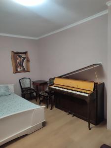 Postel nebo postele na pokoji v ubytování Milmar apartman
