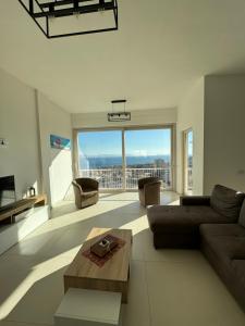 a living room with a couch and a table at Casa Langellotti plus in Naples