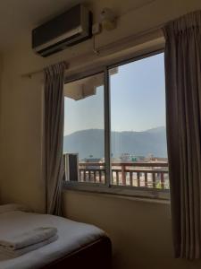 Katil atau katil-katil dalam bilik di Hotel Vibe by Solitary