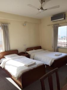 Katil atau katil-katil dalam bilik di Hotel Vibe by Solitary