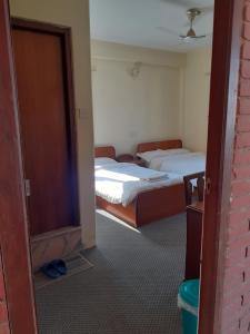 Katil atau katil-katil dalam bilik di Hotel Vibe by Solitary