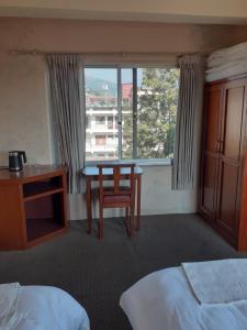 Katil atau katil-katil dalam bilik di Hotel Vibe by Solitary