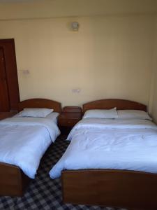 Katil atau katil-katil dalam bilik di Hotel Vibe by Solitary